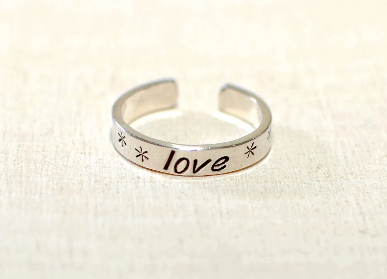Narrow style dainty toe ring in sterling silver with love